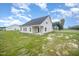 Exterior of home with backyard, showing the covered patio and ample outdoor space at 21 Trescott St, Smithfield, NC 27577