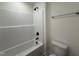 Bathroom featuring tub and shower combination with black fixtures at 21 Trescott St, Smithfield, NC 27577