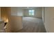This spacious bonus room features neutral carpet, natural light, and crisp white trim at 21 Trescott St, Smithfield, NC 27577