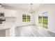 Dining area with natural light and sliding glass doors to the backyard at 21 Trescott St, Smithfield, NC 27577