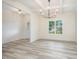 Formal dining area featuring stylish light fixture and views of the neighborhood at 21 Trescott St, Smithfield, NC 27577