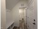 Mud room with a bench, coat hooks and access to the laundry room at 21 Trescott St, Smithfield, NC 27577