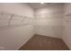 Walk-in closet with built-in shelving for ample storage at 21 Trescott St, Smithfield, NC 27577