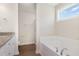 Bathroom with separate shower and bathtub, and a granite countertop at 210 Maxwell Farm Ln, Selma, NC 27576