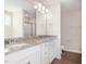 Granite countertops and double sinks highlight this spacious bathroom at 210 Maxwell Farm Ln, Selma, NC 27576