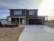 Two-story home with a two-car garage, charming curb appeal, and covered front porch at 212 Tuscany Cir, Princeton, NC 27569