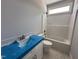 Clean bathroom featuring a vanity sink, new toilet and shower-tub combo at 221 Tee Dr, Selma, NC 27576