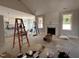 Bright living room with fireplace and windows with lots of natural light at 221 Tee Dr, Selma, NC 27576
