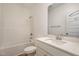 Bathroom featuring a shower-tub combo, vanity, and sink at 231 Trescott St, Smithfield, NC 27577