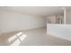 Large loft featuring neutral carpet and paint, with a half wall and multiple entrances at 231 Trescott St, Smithfield, NC 27577