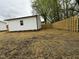 Backyard featuring a brand new fence and a new shed at 2316 Radiance Dr, Burlington, NC 27215
