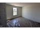 Neutral bedroom with bright natural light from a window, carpet floors, and neutral paint at 253 Trescott St, Smithfield, NC 27577