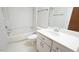 Standard bathroom features a toilet, tub/shower combo, and white vanity with ample counter space at 2765 Rue Sans Famille, Raleigh, NC 27607