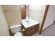 Small bathroom includes a toilet, vanity with drawers, and a large mirror at 2765 Rue Sans Famille, Raleigh, NC 27607