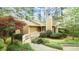 Charming home featuring a ramp, chimney, and lush landscaping at 2765 Rue Sans Famille, Raleigh, NC 27607