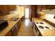 Functional kitchen featuring wood cabinets and ample counter space at 2765 Rue Sans Famille, Raleigh, NC 27607