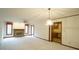 Spacious living room with a brick fireplace and neutral carpet at 2765 Rue Sans Famille, Raleigh, NC 27607