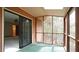 A bright, airy screened-in patio provides outdoor views and access to the indoor living area at 2765 Rue Sans Famille, Raleigh, NC 27607
