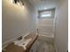 Clean bathroom featuring modern fixtures, a vanity sink, and a shower-tub combo at 28 Bailey-Boykin Rd, Selma, NC 27576
