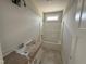 Bright bathroom with a modern vanity, shower and neutral finishes at 28 Bailey-Boykin Rd, Selma, NC 27576