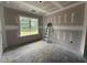 Unfinished bedroom featuring a bright window and spacious layout, ready for personalized design at 28 Bailey-Boykin Rd, Selma, NC 27576