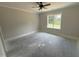 Cozy bedroom featuring a ceiling fan, neutral paint and ample natural light at 28 Bailey-Boykin Rd, Selma, NC 27576