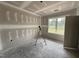 Unfinished bedroom featuring a window and spacious layout, awaiting personalized design at 28 Bailey-Boykin Rd, Selma, NC 27576