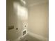 An unfinished laundry room with washer and dryer hookups at 28 Bailey-Boykin Rd, Selma, NC 27576