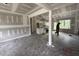 Unfinished living room featuring modern white cabinets and a spacious layout, awaiting personalized touches at 28 Bailey-Boykin Rd, Selma, NC 27576