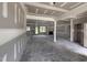 Living room under construction features fireplace, large windows, and open floorplan at 28 Bailey-Boykin Rd, Selma, NC 27576