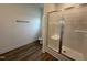 Modern bathroom featuring a glass-enclosed shower and sleek fixtures at 282 Trescott St, Smithfield, NC 27577