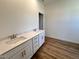 Bathroom with a double sink vanity, contemporary faucets, and modern cabinetry for ample storage at 282 Trescott St, Smithfield, NC 27577