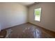 Bright bedroom with a window letting in natural light, neutral walls, and plush carpeting at 282 Trescott St, Smithfield, NC 27577