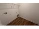 Utility area with vinyl floors, wire rack, washer hookups and dryer vent at 282 Trescott St, Smithfield, NC 27577