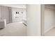 Cozy bedroom with natural light, neutral tones, and a glimpse into the walk-in closet at 815 Central Park Dr, Knightdale, NC 27604