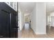 Bright foyer leads to an open living area with hardwood floors, creating a warm and inviting space at 30 Tee Dr, Selma, NC 27576