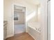 Bathroom with granite countertops, vanity, tub and view to bedroom at 300 Tuscany Cir, Princeton, NC 27569