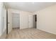 Neutral bedroom with doors to closet and a bathroom/hallway at 300 Tuscany Cir, Princeton, NC 27569