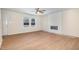 Light-filled living room showcasing wood floors, a modern fireplace, and an open layout at 300 Tuscany Cir, Princeton, NC 27569