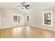 Spacious bedroom featuring a vaulted ceiling, neutral paint, and bright windows at 307 E Pope Ave, Kenly, NC 27542