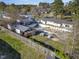 Aerial view showing the home, pool, outbuildings, and grounds at 309 14Th St, Butner, NC 27509