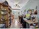Bright office space featuring built in bookshelves and a large desk area at 309 14Th St, Butner, NC 27509