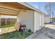 Backyard with a detached outbuilding and a wood support structure at 309 14Th St, Butner, NC 27509