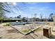 Backyard with an empty in-ground swimming pool undergoing renovation at 309 14Th St, Butner, NC 27509