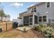 The home's backyard features a patio area and lush landscaping for peaceful enjoyment at 309 Millennium Dr, Pittsboro, NC 27312