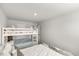 Bedroom with twin beds, closet, and natural light at 309 Millennium Dr, Pittsboro, NC 27312