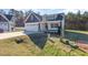 Stylish single-Gathering home featuring a two-car garage, and attractive landscaping at 32 Bonnybrook Ct, Selma, NC 27576