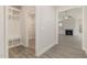 View of the hallway with coat rack and adjacent living room at 32 Bonnybrook Ct, Selma, NC 27576