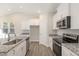 Well-equipped kitchen with granite countertops, stainless steel appliances, and plenty of cabinet space at 32 Bonnybrook Ct, Selma, NC 27576