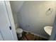 Small bathroom with new fixtures including the toilet, sink, vanity, and towel rack at 33 W Emily Gardens Dr, Selma, NC 27576